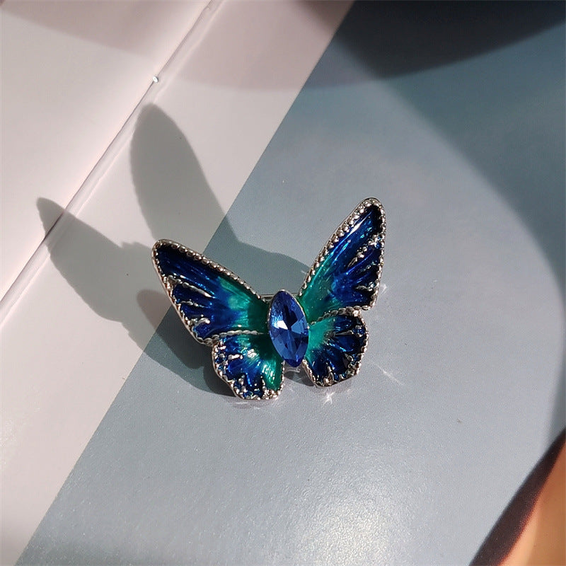 Close-up of crystal butterfly brooch
