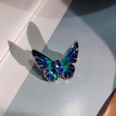 Close-up of crystal butterfly brooch