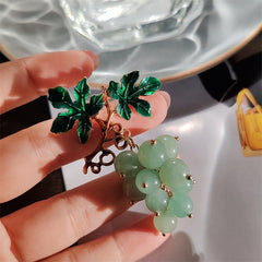 Charming brooch showcasing grapes and cherries