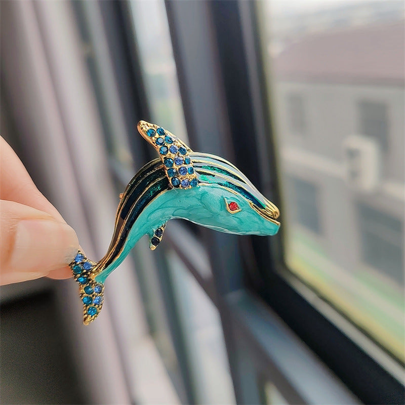 Elegant enamel whale brooch for gifting