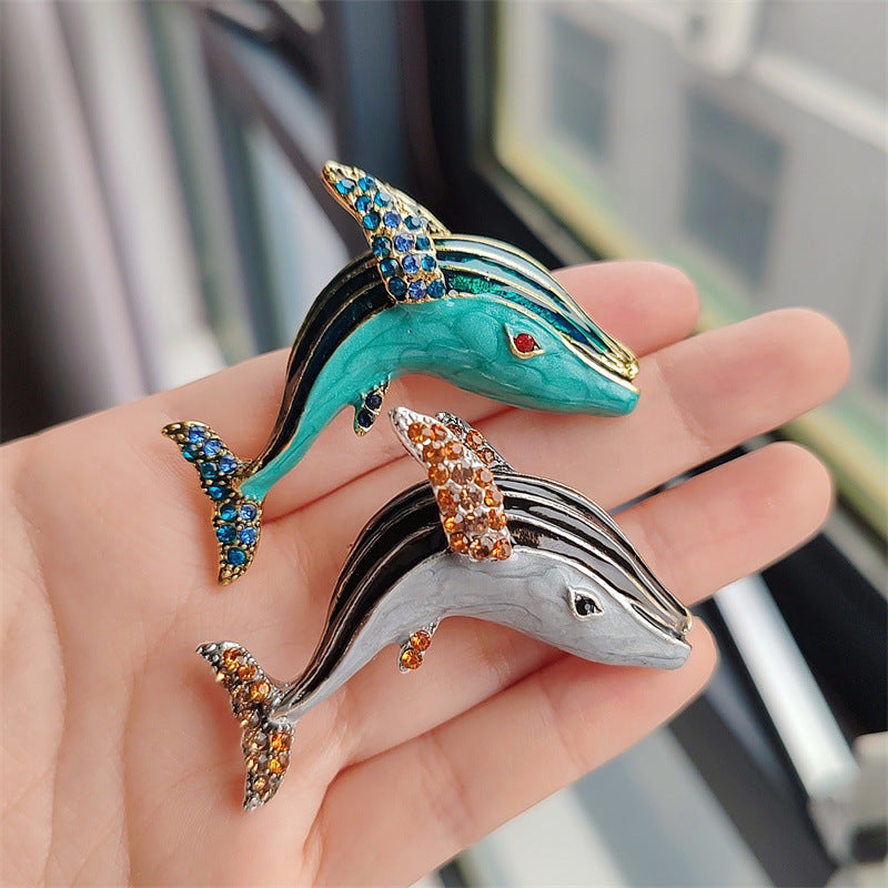 Rhinestone embellished dolphin brooch