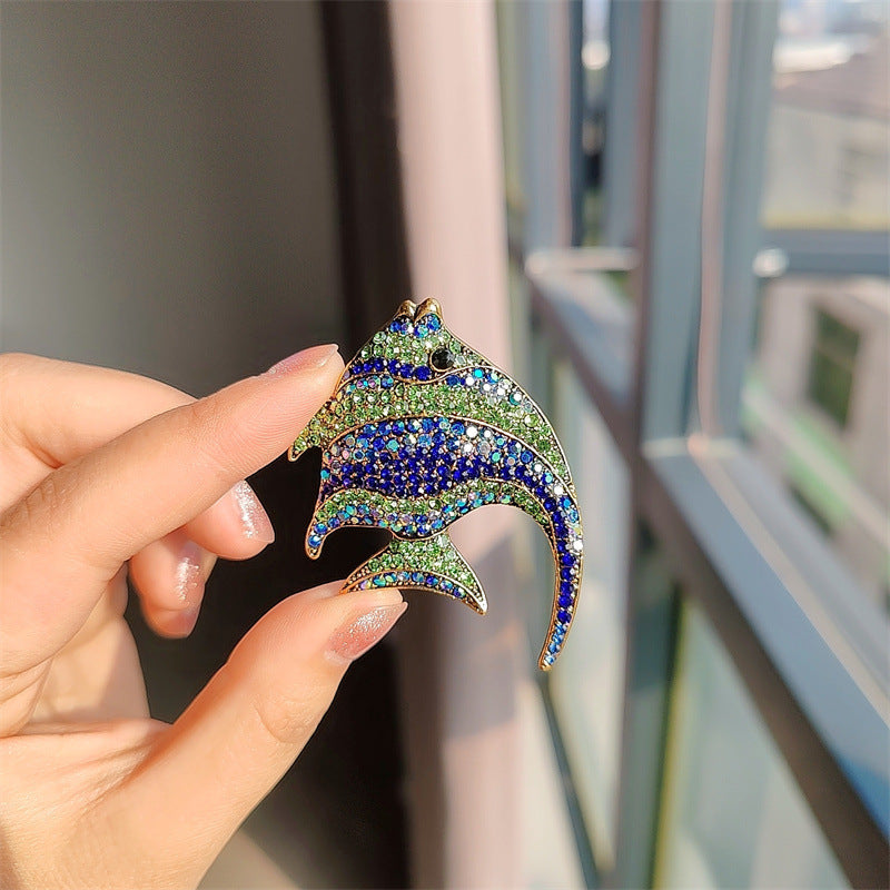 rhinestone brooch worn on a stylish jacket