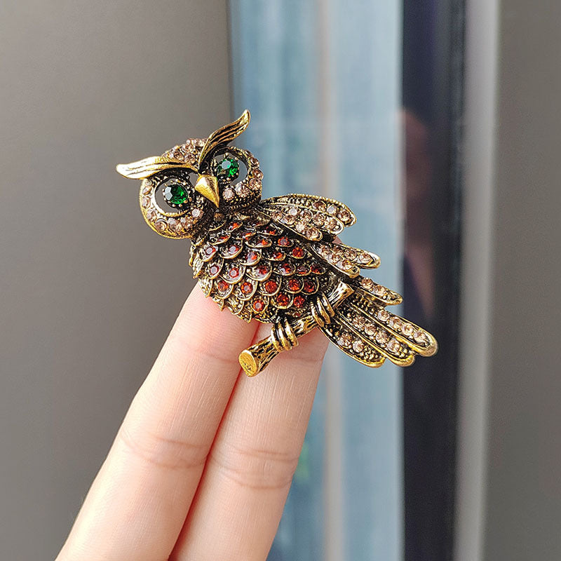 Artistic shot of the blue owl pin highlighting craftsmanship