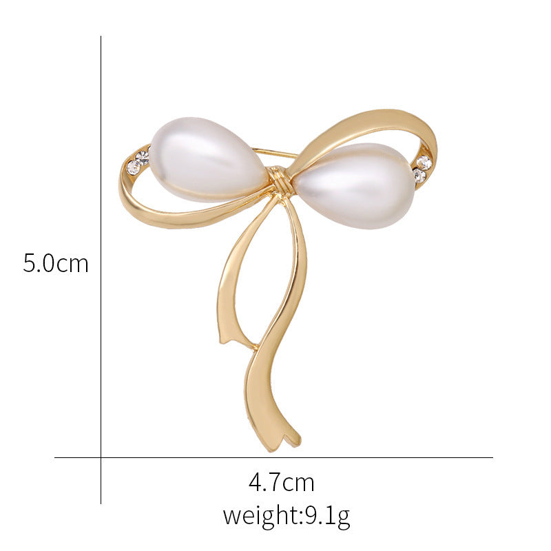 Elegant Pearl Bow Brooch in Gold Colour - Image 7