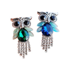 Close up of a trendy owl brooch