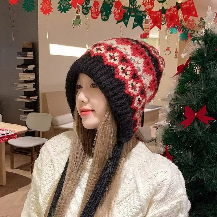 Knitted beanie showing side view in khaki