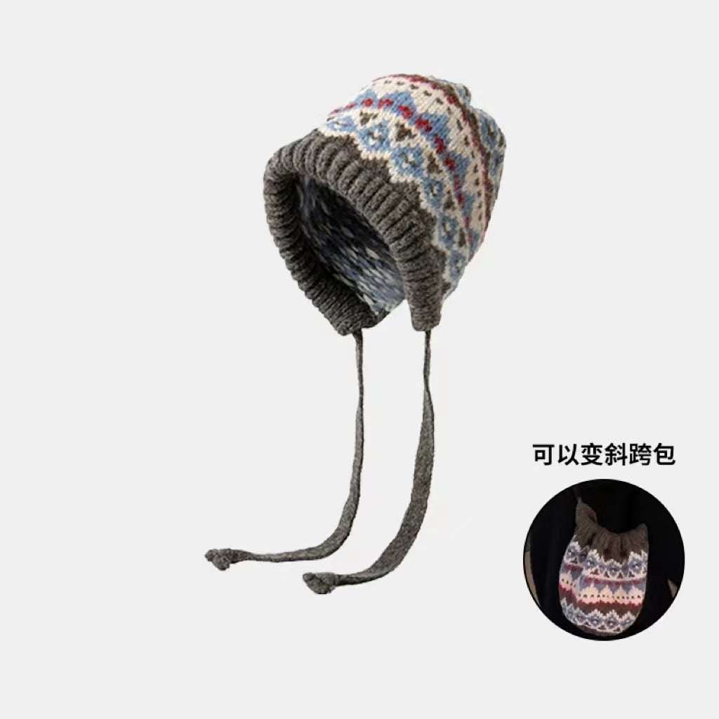 Knitted beanie showing side view in khaki