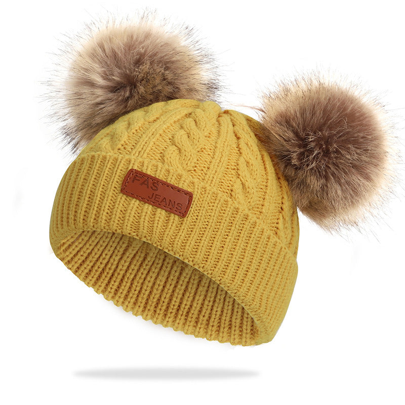 Cozy winter accessories for children on display