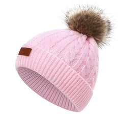 Kids wearing winter hat and scarf outdoors