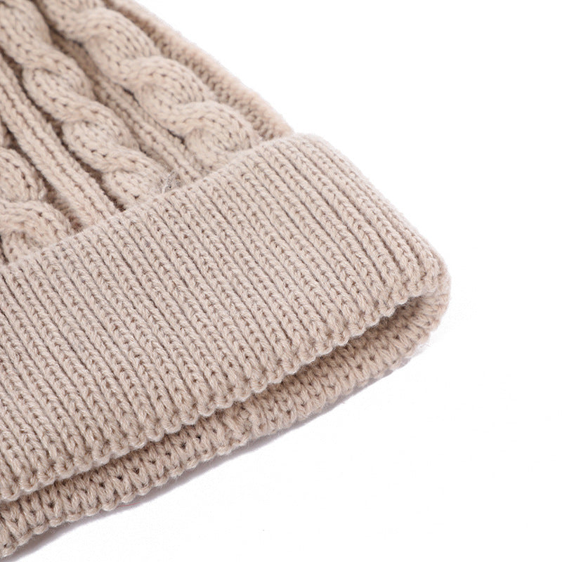 Multiple knit beanie hats in various colours