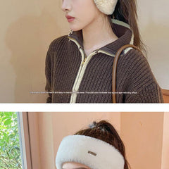 Pink winter beanie displayed in sporty wear