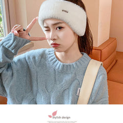 Close-up of a women's ear warmer beanie from the top view