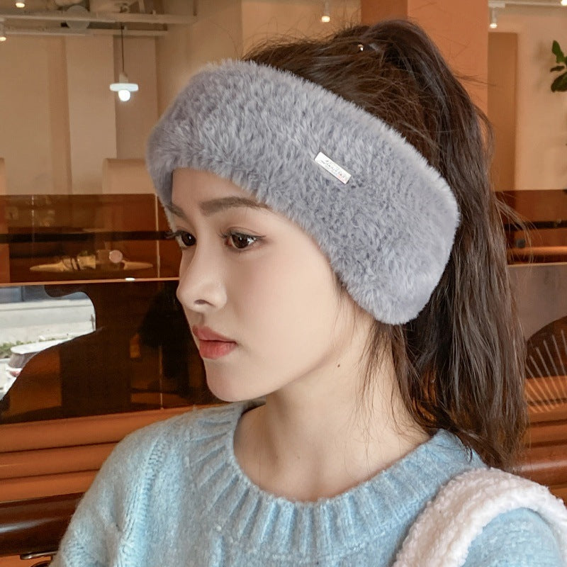 Black winter beanie shown in casual setting