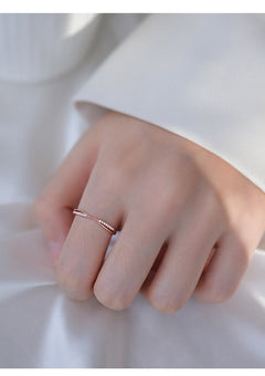 Rose gold adjustable ring with cross lines