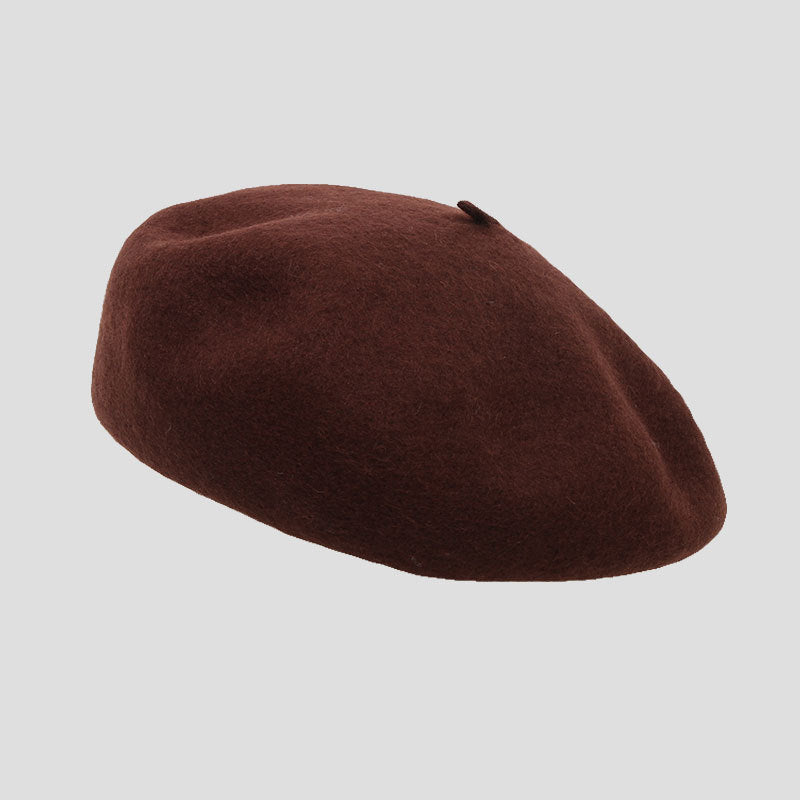 Close-up of round top wool beret design