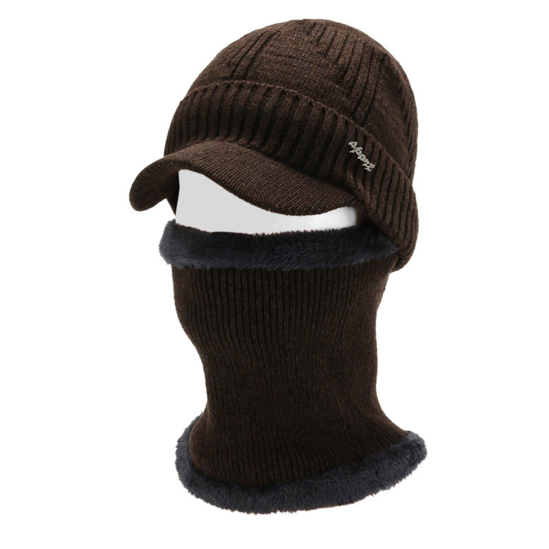 Model wearing stylish winter hat and scarf outdoors