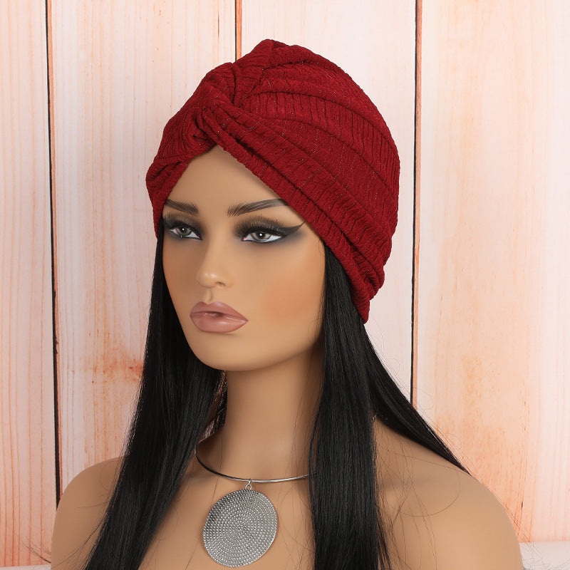 white elastic twist headwrap beanie styled on a model