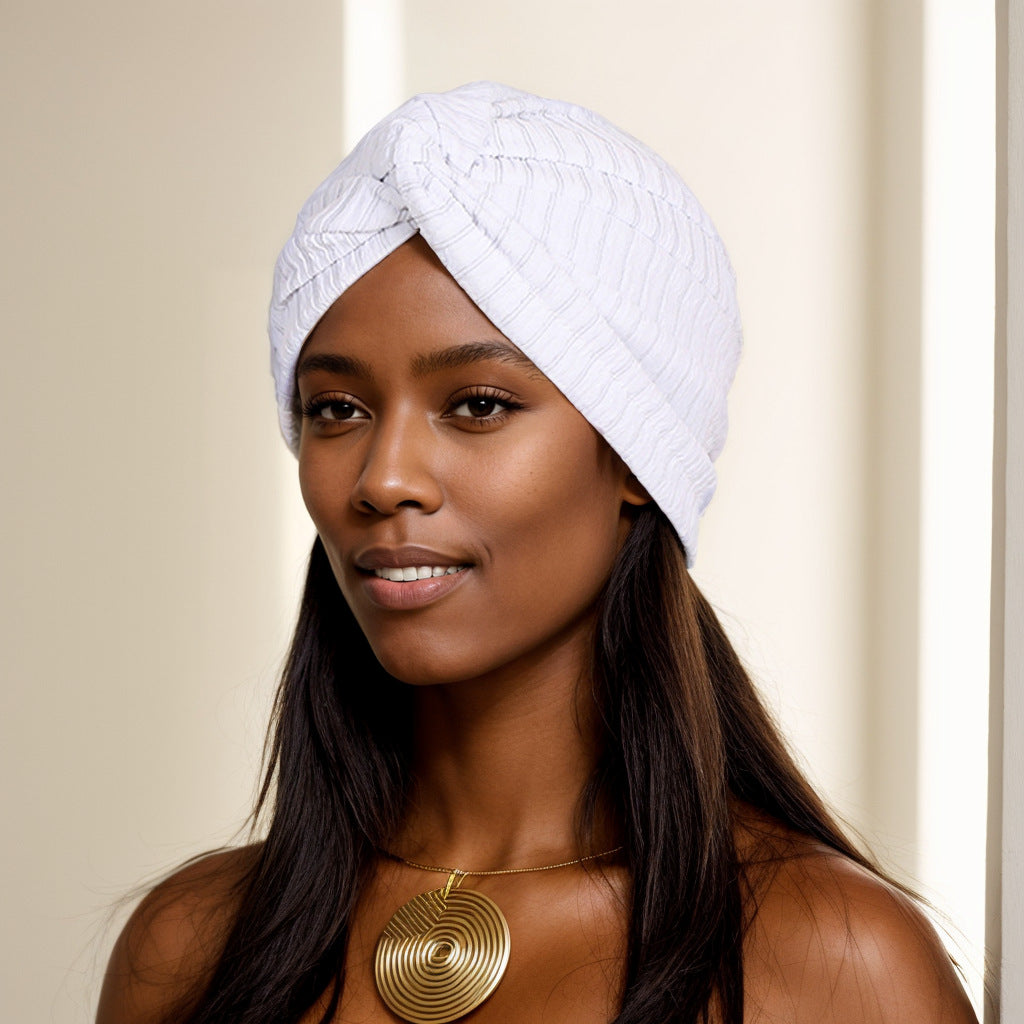 close-up of the twist knot design of the headwrap beanie
