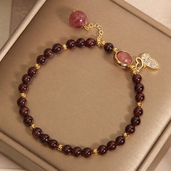 Vintage garnet bracelet showcasing butterfly design