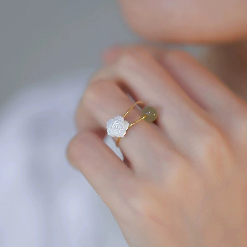 Detailed view of adjustable flower ring for women