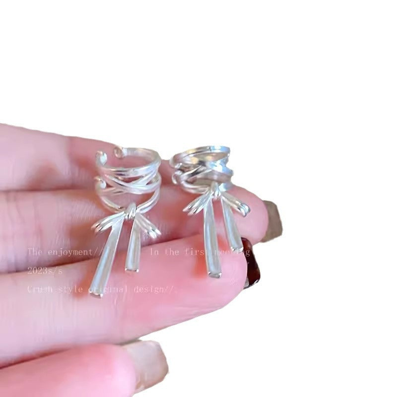 Close-up of beautiful ribbon bow ear cuffs