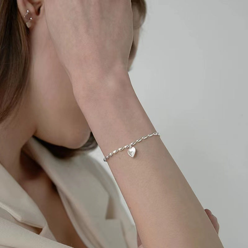 Close-up of the minimalist heart bracelet for women