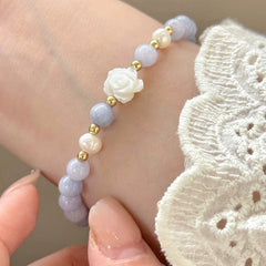 elegant camellia flower bracelet on display