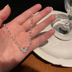 Women's Fashion Butterfly Necklace on the table