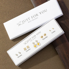 close-up of elegant heart and flower drop earrings image 2