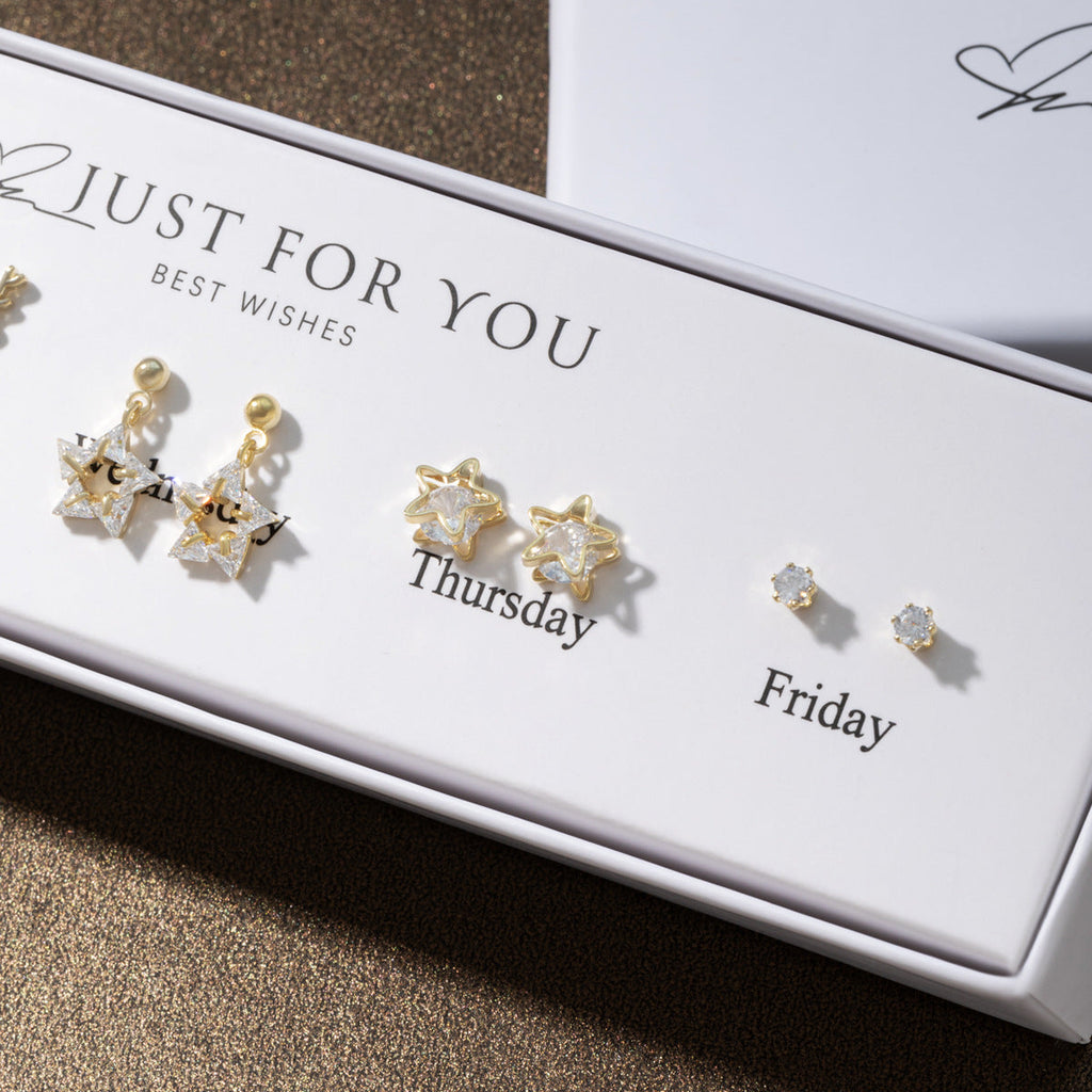 Lightweight heart cat ear studs on white background