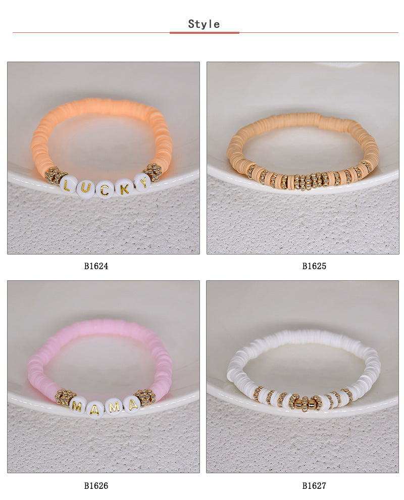 Close-up of colourful geometric charm bracelet