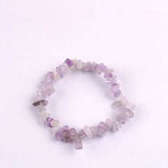 Close-up of colourful crystal charms on bracelet