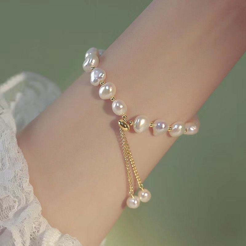 Handcrafted irregular design pearl bracelet on model