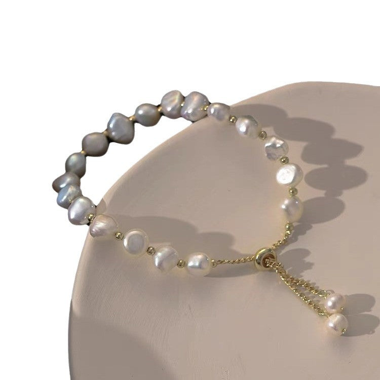 Elegant faux pearl bracelet showcasing various angles