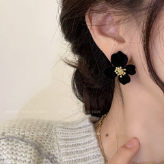 Stylish Velvet Floral Earrings displayed in a box