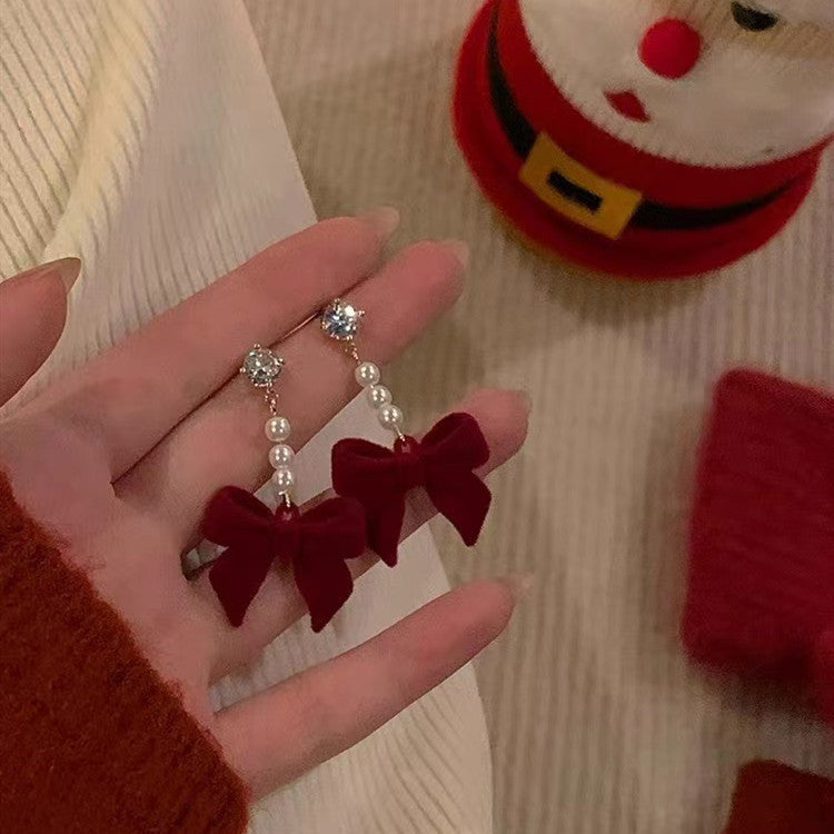 Chic red velvet bow earrings for any occasion