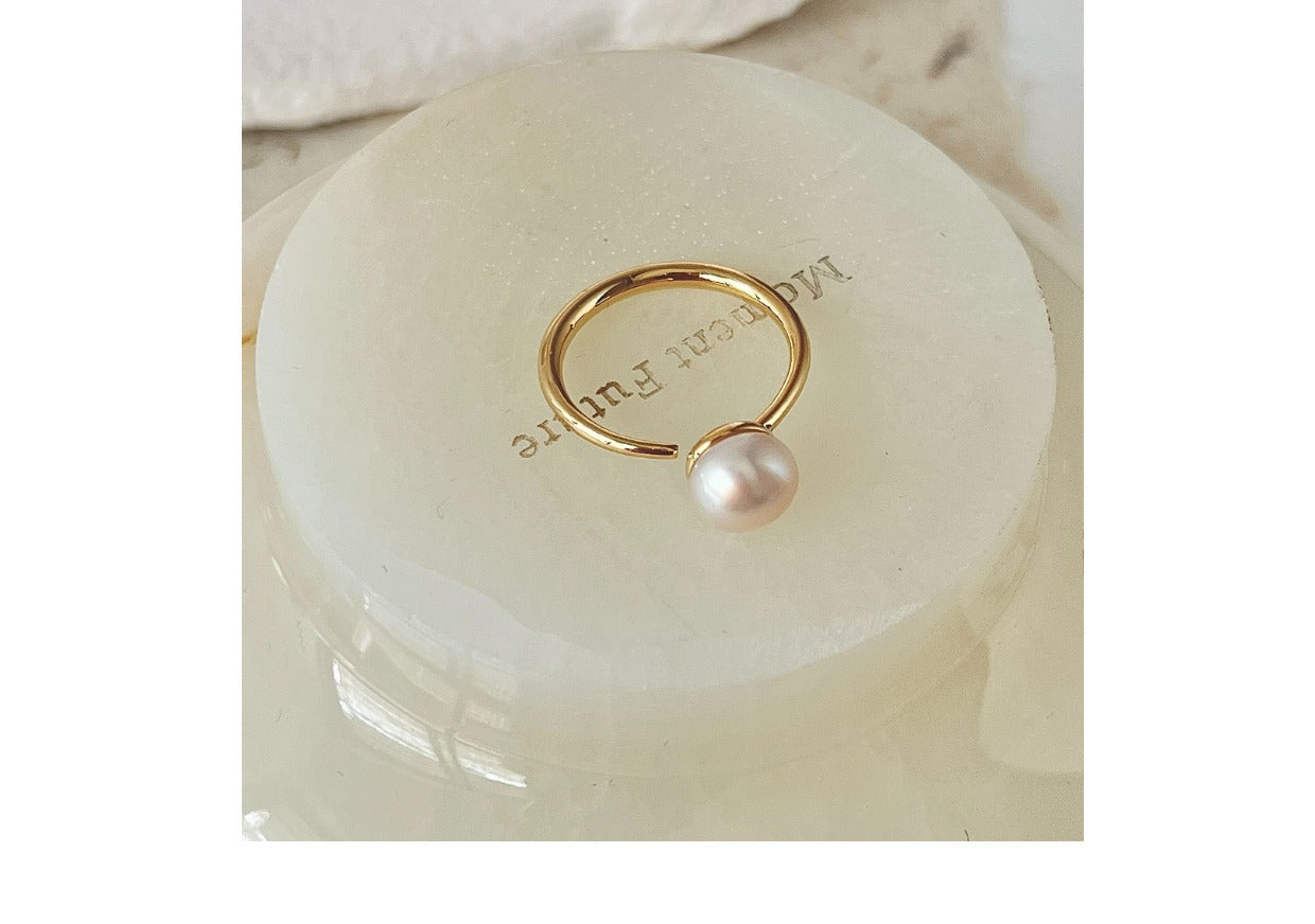 Elegant butterfly ring on mannequin hand
