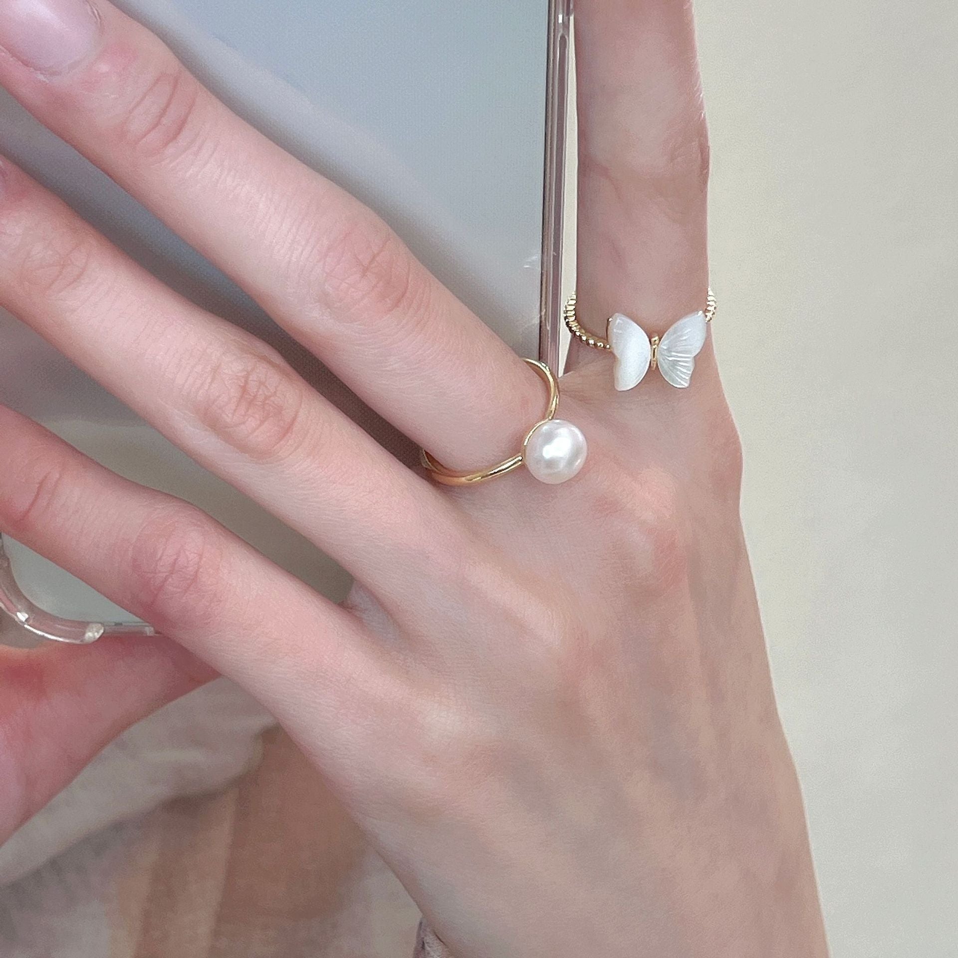 Adjustable open butterfly ring showcased