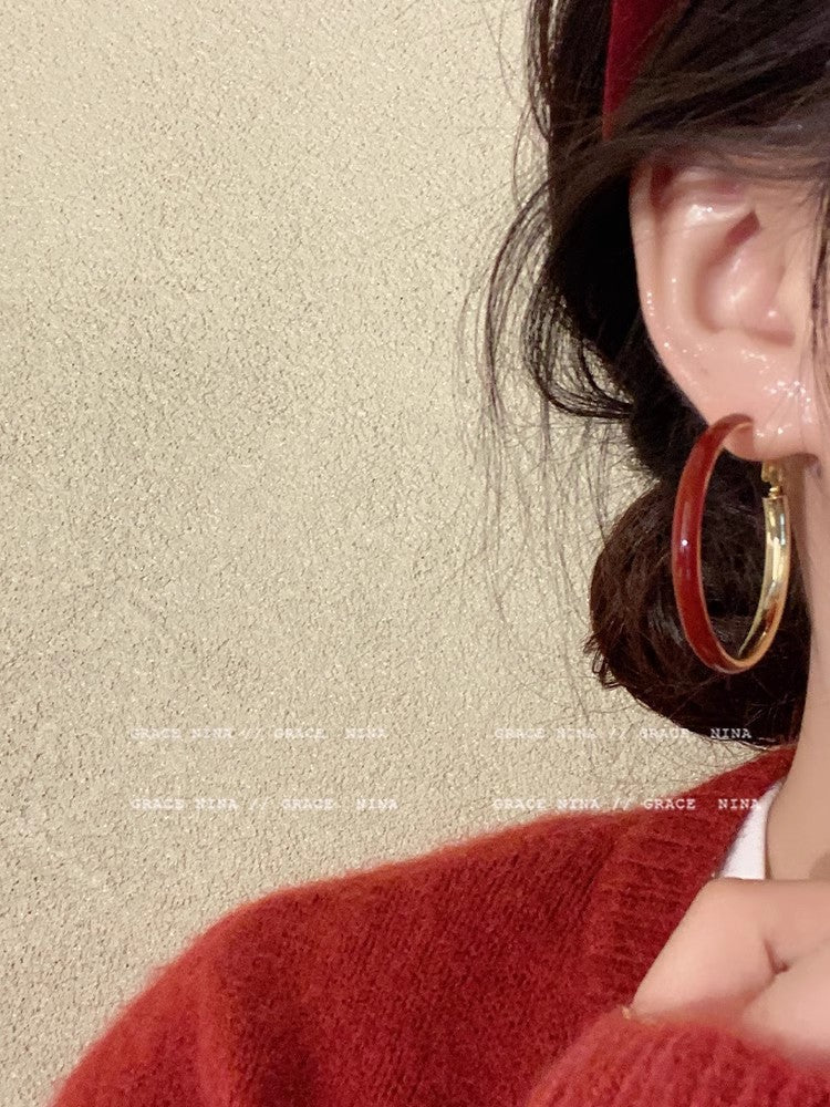 Unique design circle earrings on white background