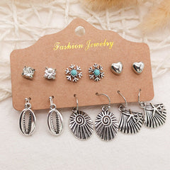 Close up of Leaf and Feather Dangle Earrings design