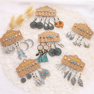 Close up of Leaf and Feather Dangle Earrings design