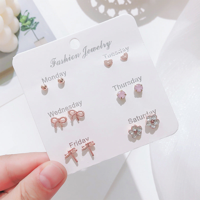 Stylish Korean Autumn Winter Pearl Bow Earrings Set - Image 10