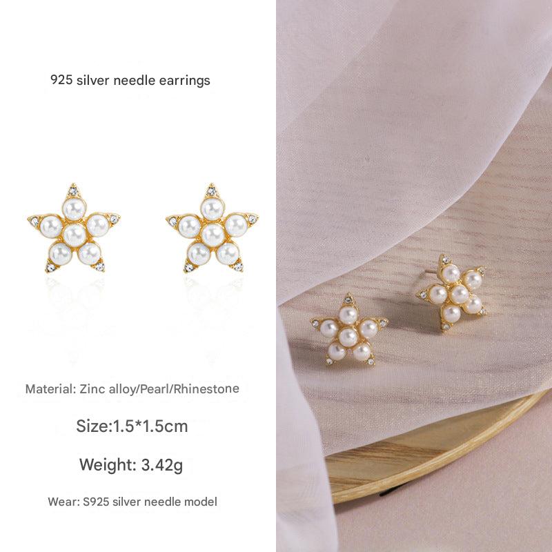 Close-up of flower pearl earrings 3