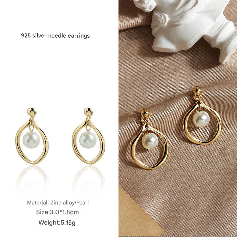 Elegantly displayed pearl earrings detail 2