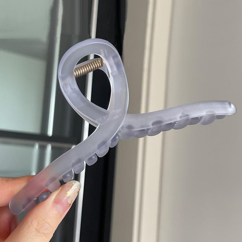 Lightweight hair clip showcased on a mannequin