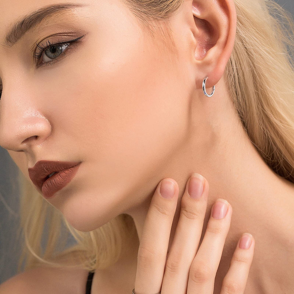 Stylish earrings displayed on a clean background