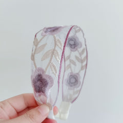 Fashionable floral headband in various styles