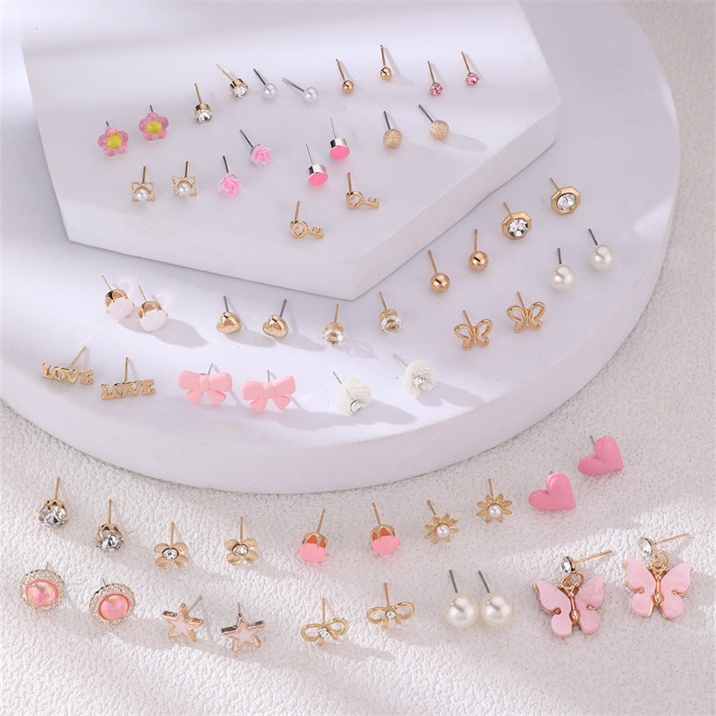 Heart-shaped pearl earrings displayed elegantly
