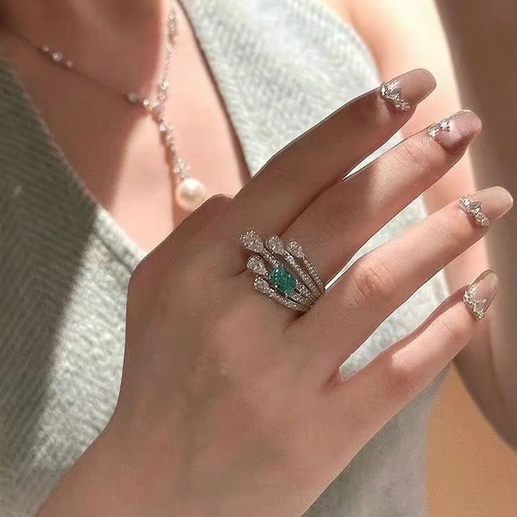 Adjustable open design of the Paraiba ring