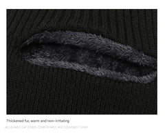 Person wearing a warm neck warmer and beanie
